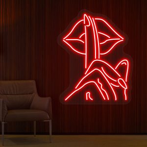 finger on lips neon sign